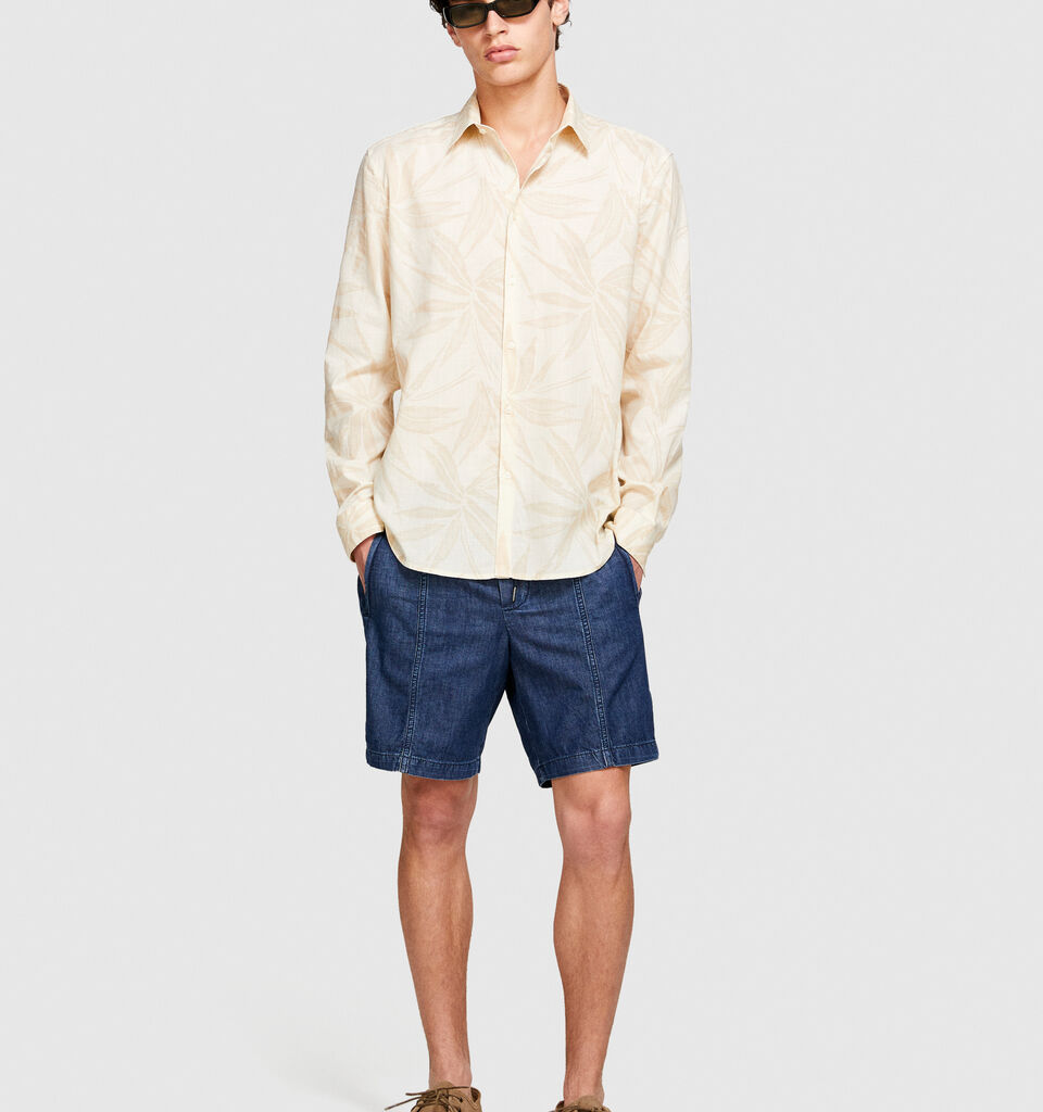 Bermudas in chambray - men's jean shorts - Blue | Sisley image number 1
